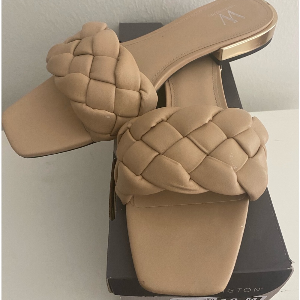 Cute woven leather slides.